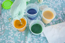 Stir soap and colour until well blended