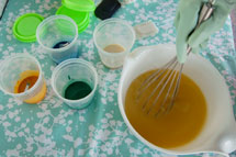 Pour traced soap into soap colours
